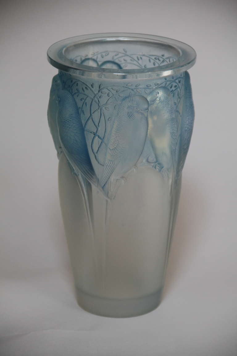 In opalescent glass with blue patina. Listed in Felix Marcihac catalogue raisonne as model 905, page 418.