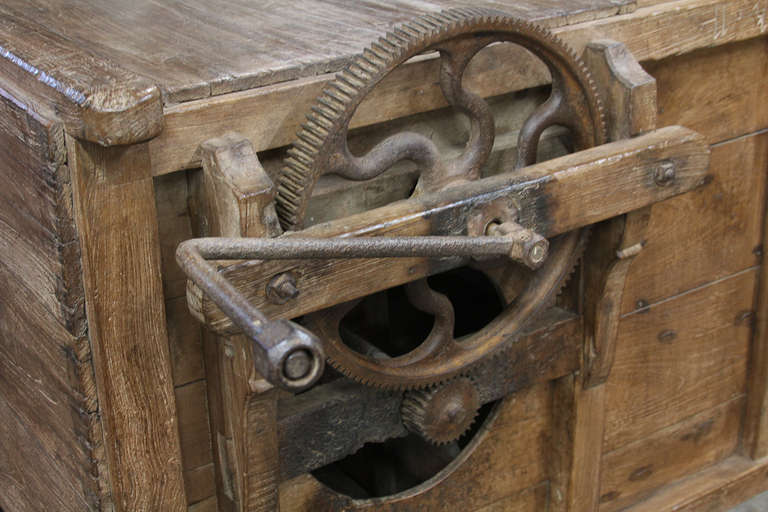 Here we have an antique grain cleaner from India, constructed of Burmese teak.  
Doesn't everyone need one of these?