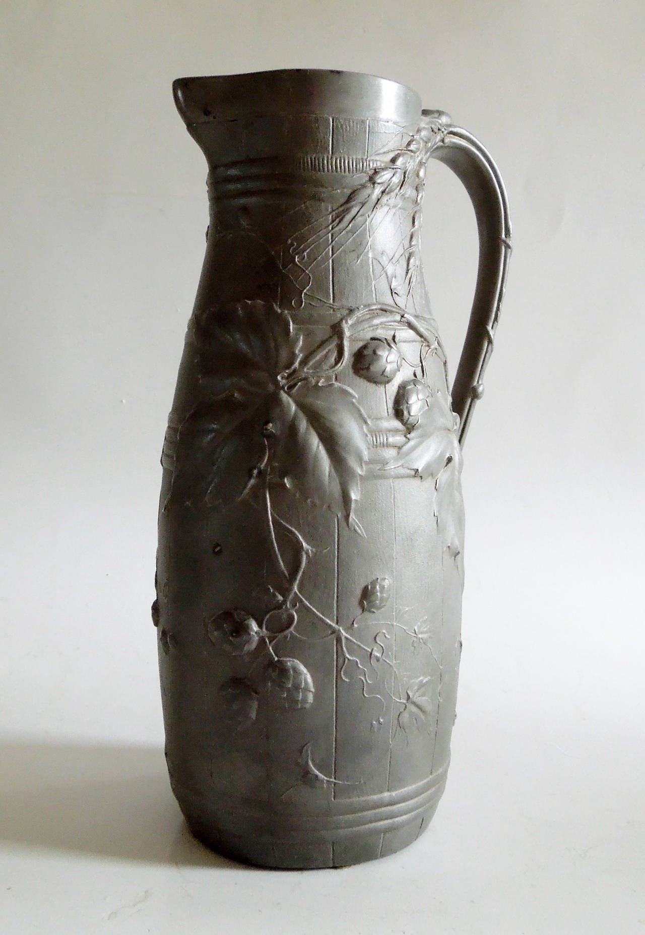A French beer or water jug with naturalist decoration of barley and hops. The model for this jug was created in 1897.

Jules Brateau (1844-1923) was a silversmith of exceptional talent, and began his career working in gold for the more important