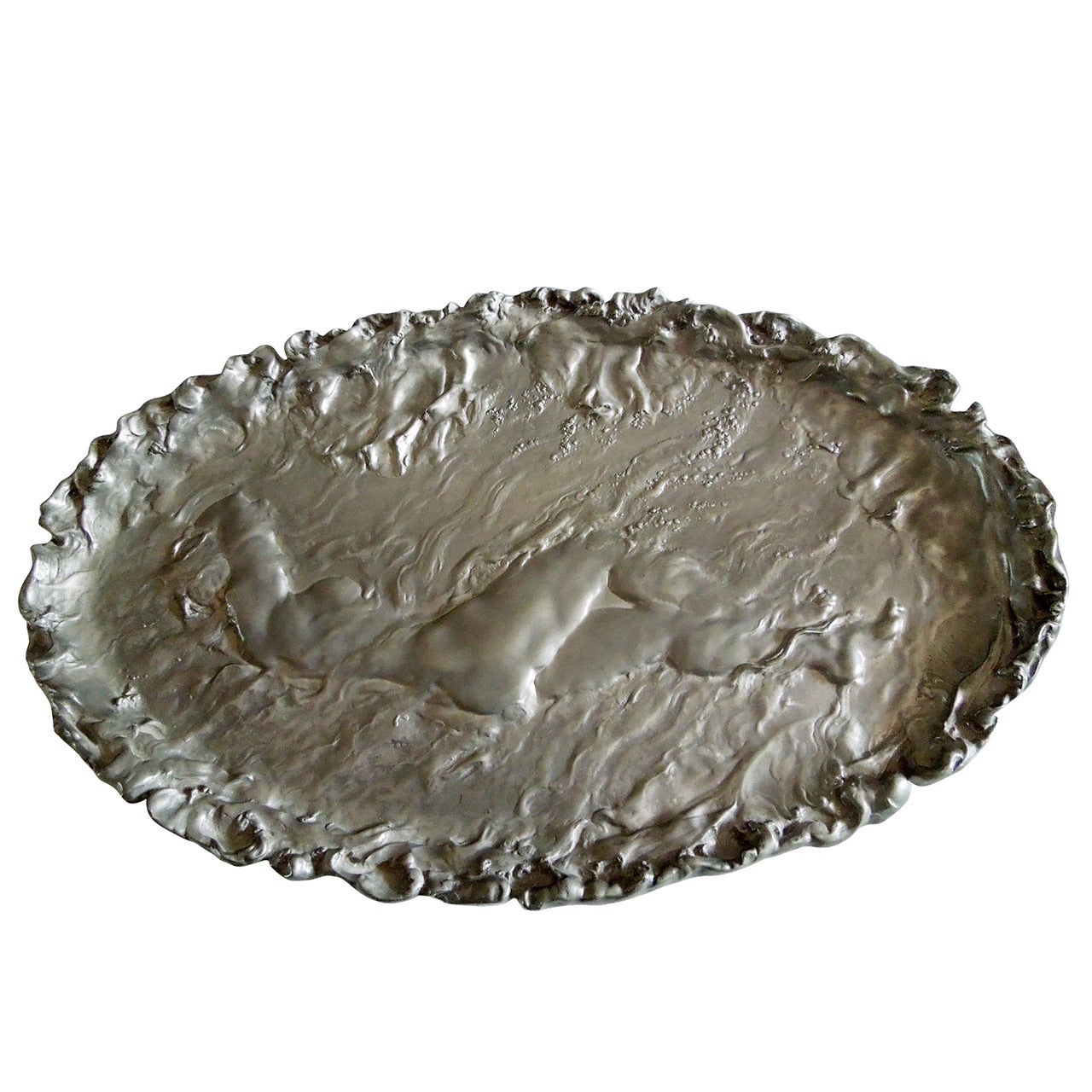 A Large French Oval Pewter Plaque Of A Female Nude, By Jules Desbois.