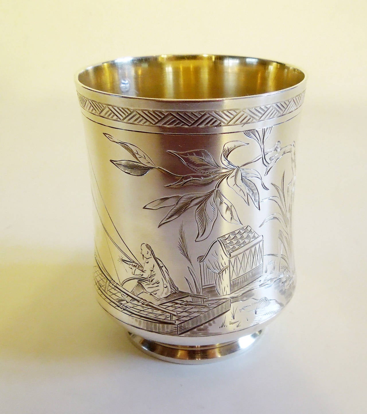 A French silver flared form silver and gilt footed goblet with engraved japonisant decoration by César Tonnellier. Fully marked with maker’s mark and silver guarantee mark. 139 g.
Tonnellier, was active from 1845 until 1882. He  made silver