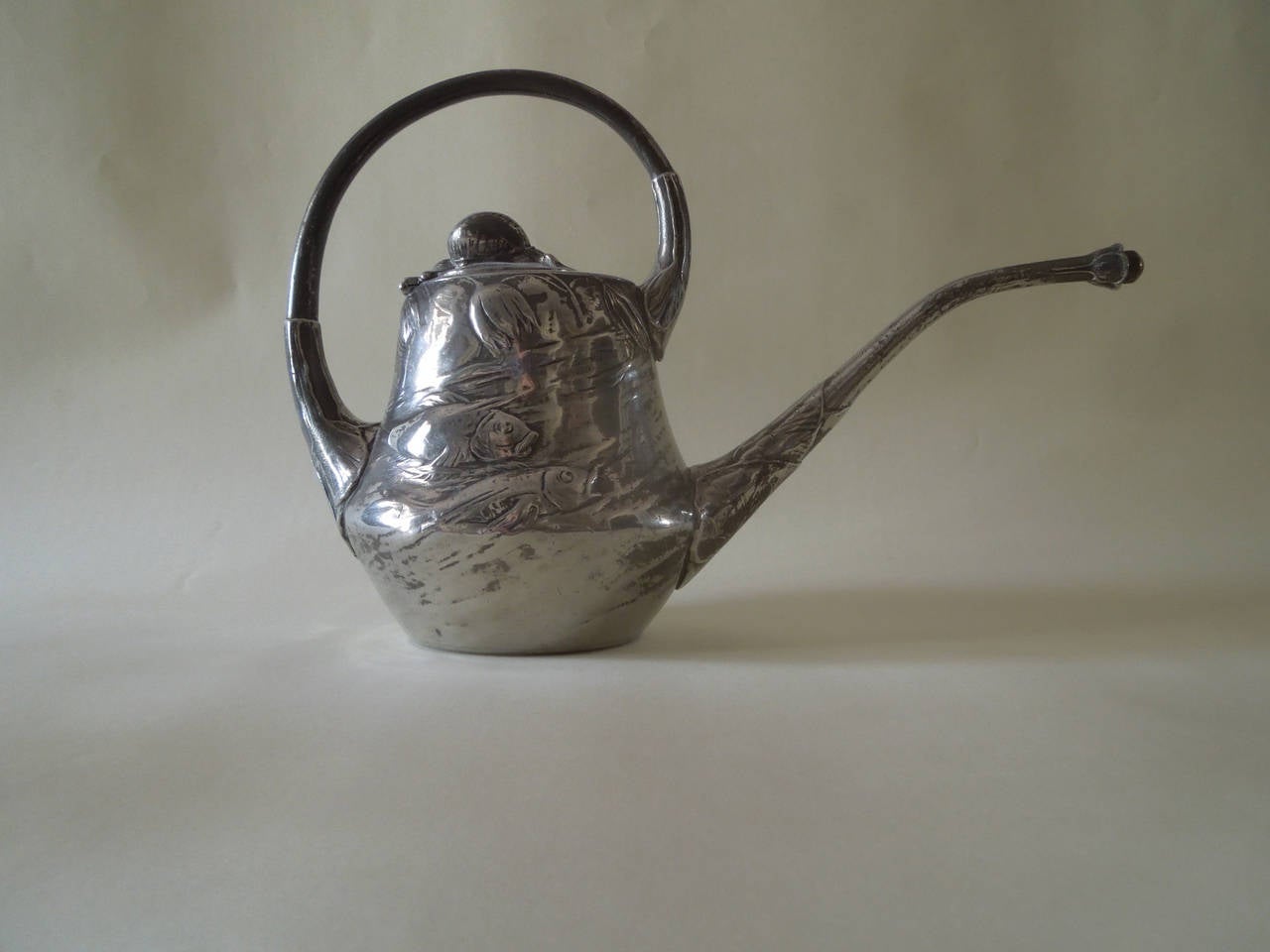 A very rare Art Nouveau Kayserzinn pewter watering can by Hugo Leven. Stamped on the base. The nozzle at the end of the spout unscrews.

See images from the trade catalogue: Kayserzinn-Gegenstände : Vornehmster Tischgeräth : Gedienster und