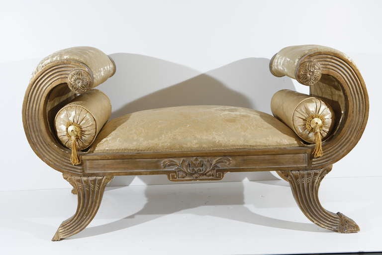 A set of three neoclassical gilded wood upholstered banquettes. Individually priced.