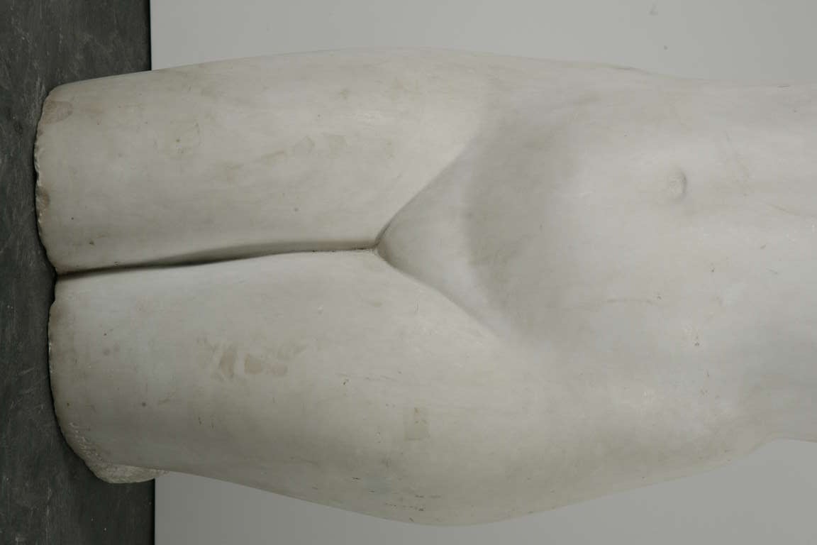 a white carrara marble bust of a woman signed by J. Hardy from early 20th century. J Hardy was part of a movement called 'boudoir art' which were mainly paintings and etchings of young women - not nudes - intended to be hung in the boudoirs of