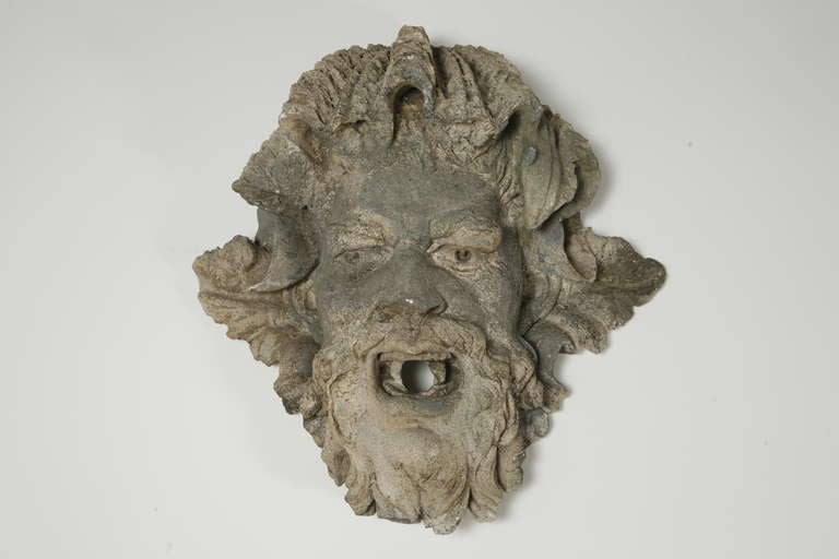 Grotesque wall mask from a wall fountain, circa 1810.