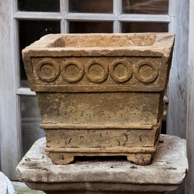 Carved out of blocks of limestone this pair of rustic planters is perfect for a garden with character.