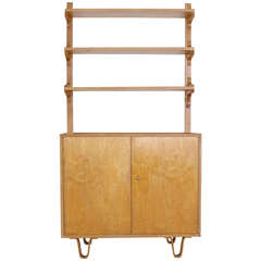 Cees Braakman combined the cabinet with an elegant shelves wall system