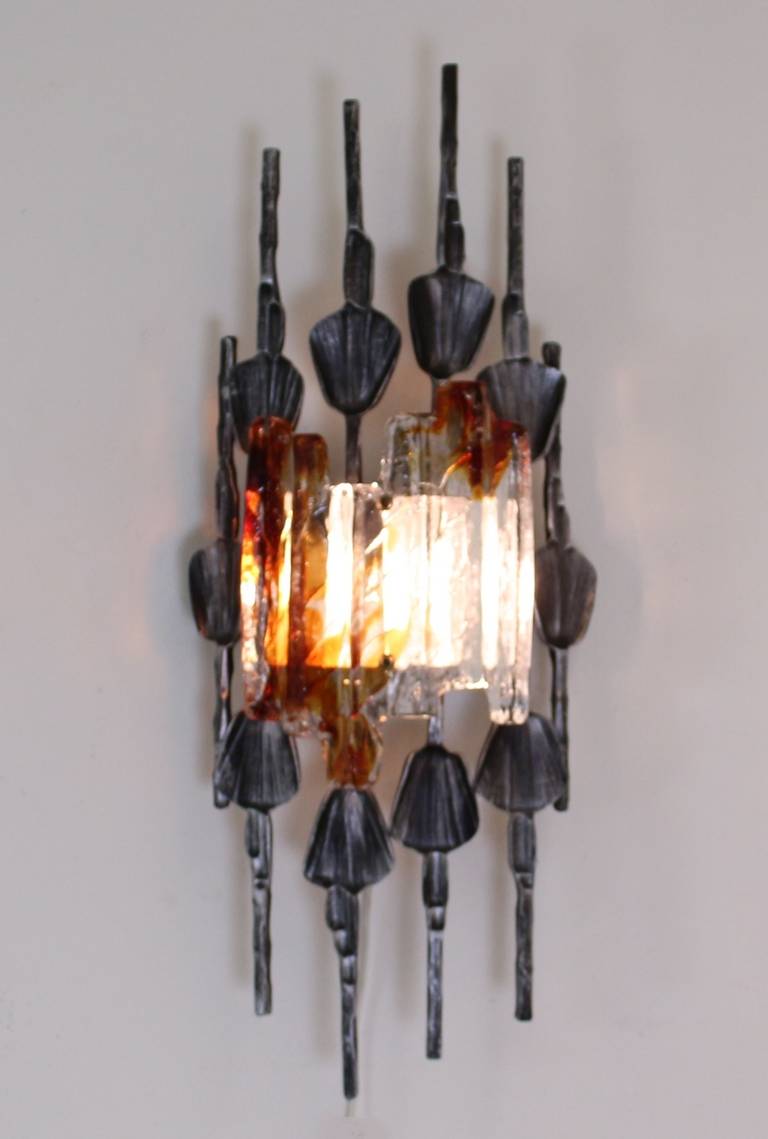 Typical Brutalist wall sconce. Designed by Ahlström & Hans Ehrich for A&E lighting company, Sweden.
Metal and glass.