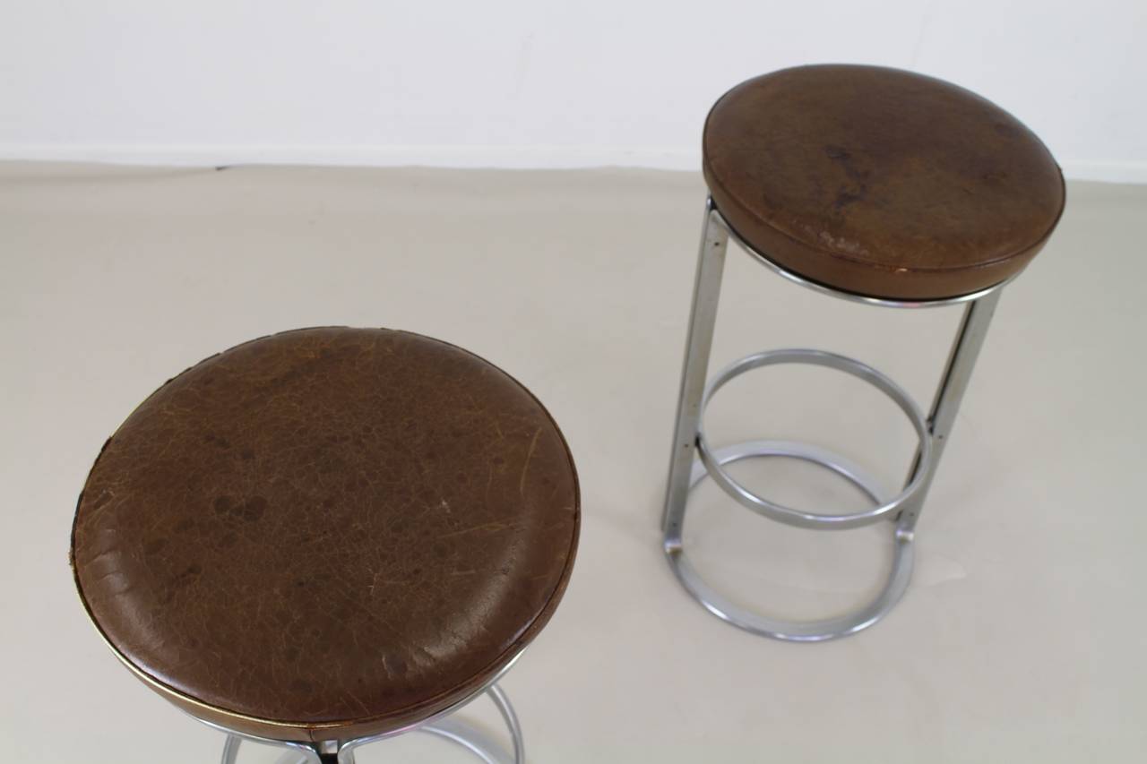 High quality production steel furniture.
Designer: Horst Bruning.
Manufacturer: Kill International (Alfred Kill).
Hard to find original bar stools.
Leather seating with serious wear.