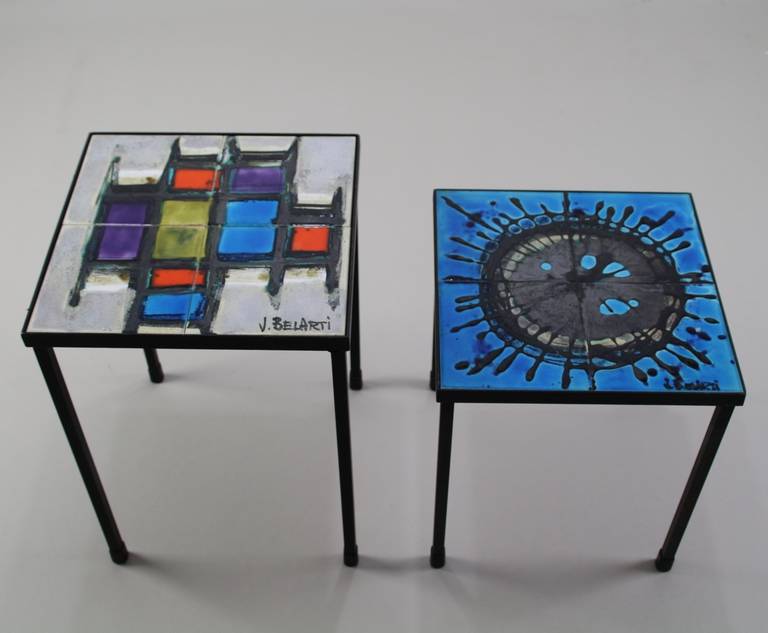 These two sidetable have a stunning pattern
Artist/Designer: Julien de Covemaeker (1929-2008)
Manufacturer: Belarti Oostende Belgium
Two small side tables with ceramic tiles
Black metal frame
Blue side table: 32cmx32cmx37cm