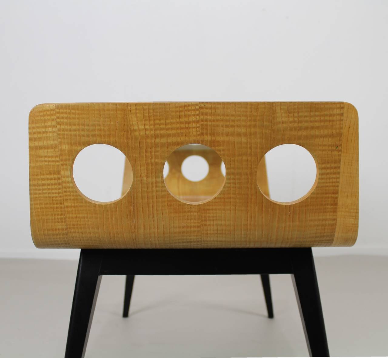 Typical 1950s coffee table.
Designer: Cor Alons.
Manufacturer: Den Boer Gouda.
Ebonized base.
 