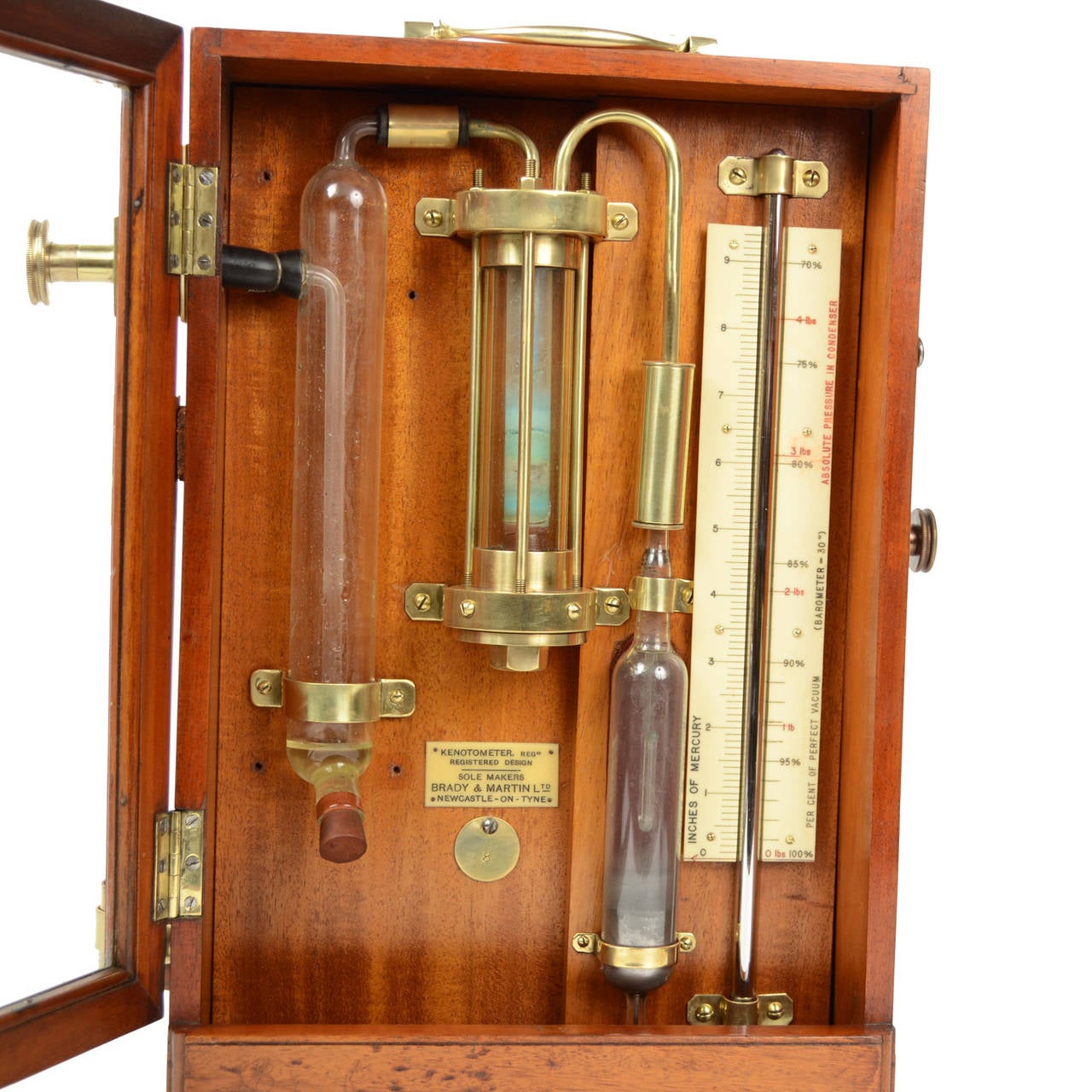 Kenotometer signed Brady & Martin Ltd Newcastle-on-Tyne, early 1900. It is an instrument used on a ship to measure the pressure in the condensers of steam turbines. It consists of a system of pipes and vials, glass and brass, placed in teak and