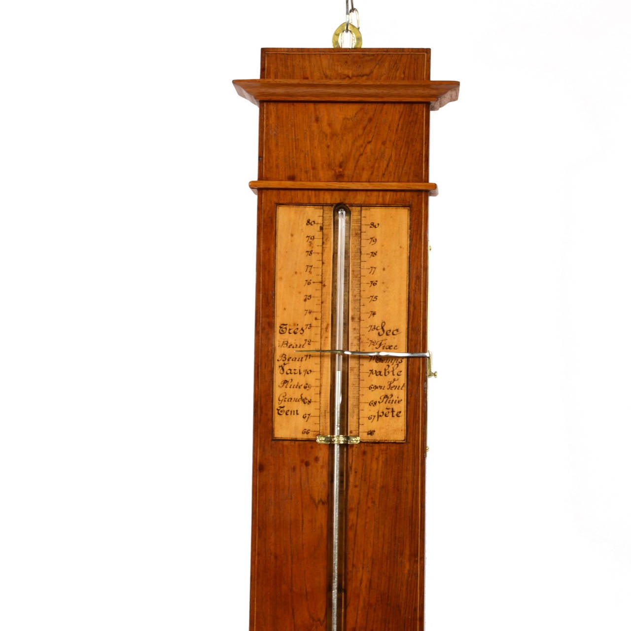 Elegant mercury barometer with a glass tube filled with mercury, with the open side in a bulb with other mercury. The tube is mounted on a mahogany plank, with some cedar wood parts; it has a mercury and alcohol double thermometer for algebraic