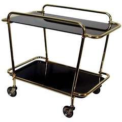 Chariot de service à thé ou chariot de bar en laiton et verre noir des années 1950 en Italie