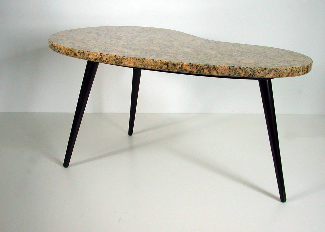 black kidney shaped coffee table