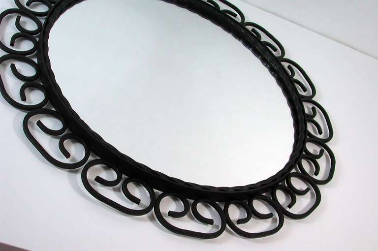 wrought iron framed mirror