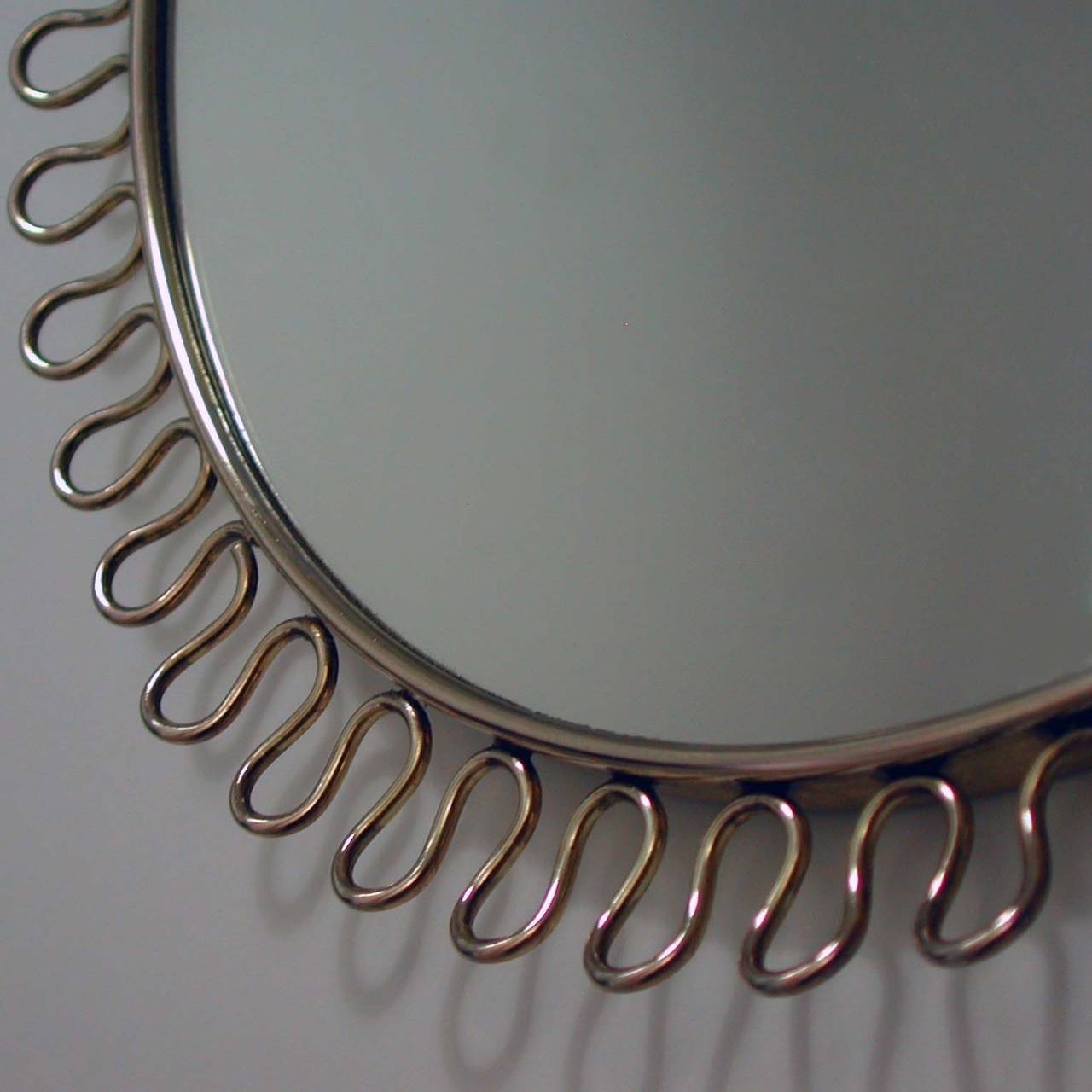 Mid-20th Century Petite Sculptural Brass Loop Mirror attr. to Josef Frank for Svenskt Tenn, 1950s