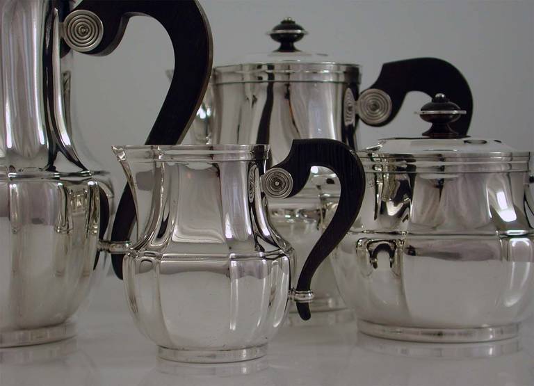Awesome and very elegant 4 pc CHRISTOFLE silver plate and rosewood tea and coffee set, made in France in the 1930s.
Excellent clean and professionally polished condition. No plate wear, ready for use or display.
Measurements: tea pot height