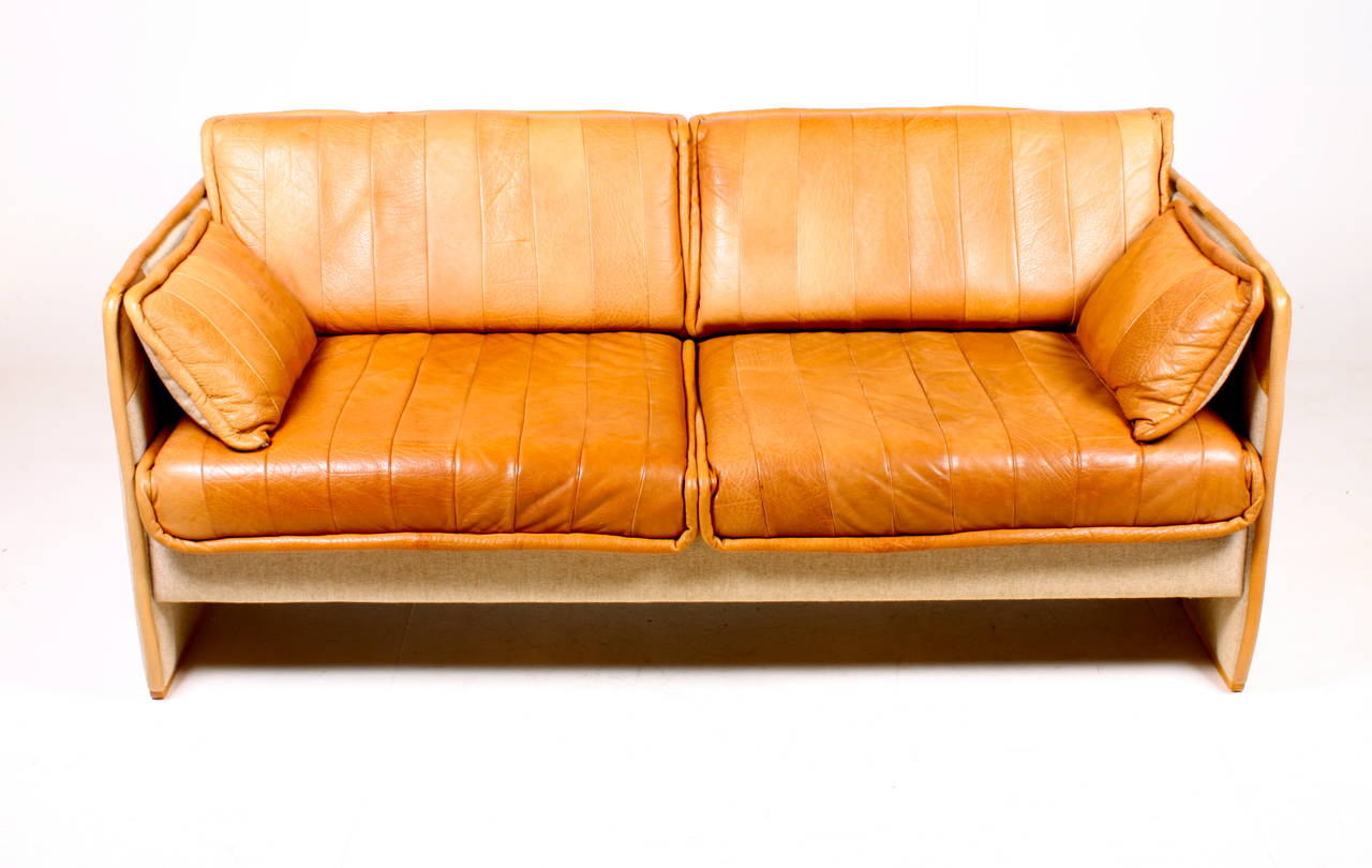 Great looking sofa in natural leather and fabric, made in Denmark in the 1960s. Good original condition.