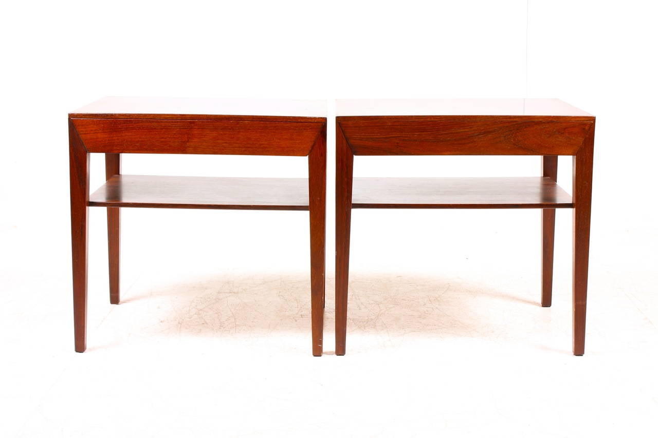 Stunning pair of all original nightstands / end tables in rosewood. Designed by Severin Hansen and produced by Haslev Furniture of Denmark in the 1960s.
