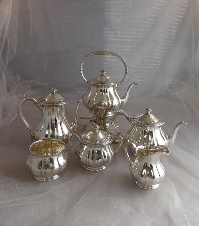 vintage silver tea set with tray