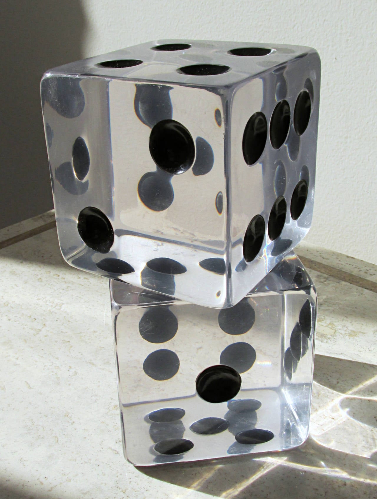 Clear lucite dice with black enamel spots