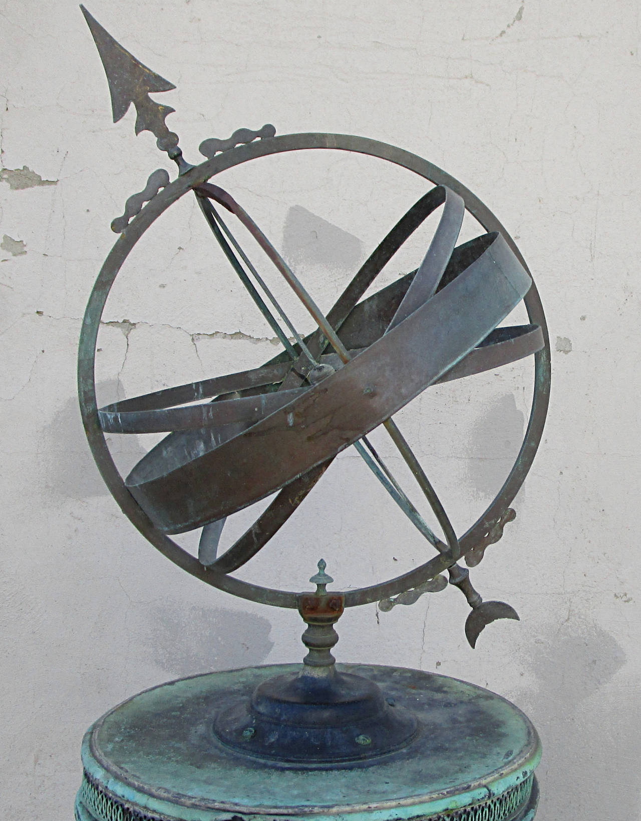Simple and elegant this 19th century armillary has beautiful rich patina in hues of green and charcoal with hints of burnt orange. The base is marked Whyte & Co Glasgow. Retains an original inscription plaque.