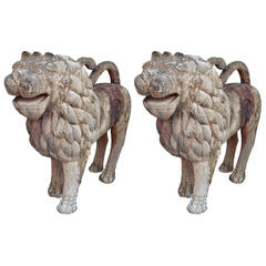 Early Pair of Carved Regal Lions