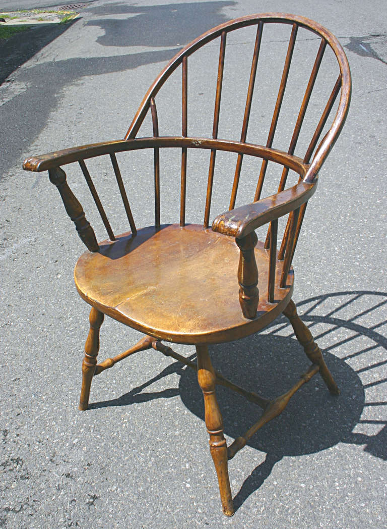 Metal windsor arm chair with faux wood grain painted finish