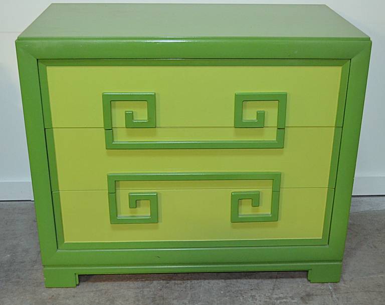 Pair of green on green Greek key three drawer chests by Kittinger. Excellent as found condition complete with sliding accessory tray in top drawer of each chest. Branded logo. Night stands mirror and full size bed also available.