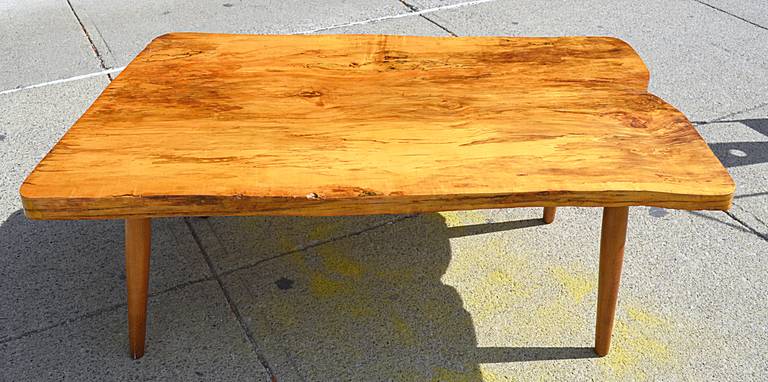 A beautiful single board top of spalted maple resting on four tapered dowel legs. top appears to have original shellac finish. Signed and dated on underside,1967.