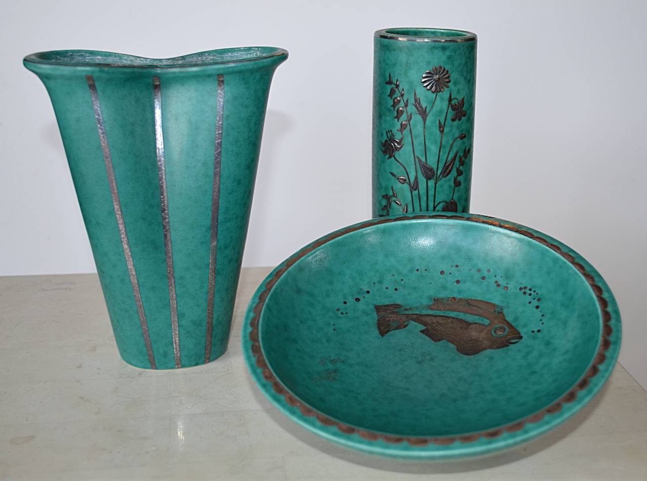 Three pieces of Gustavsberg ceramics by Wilhelm Kage with silver inlays. Fish bowl is 7