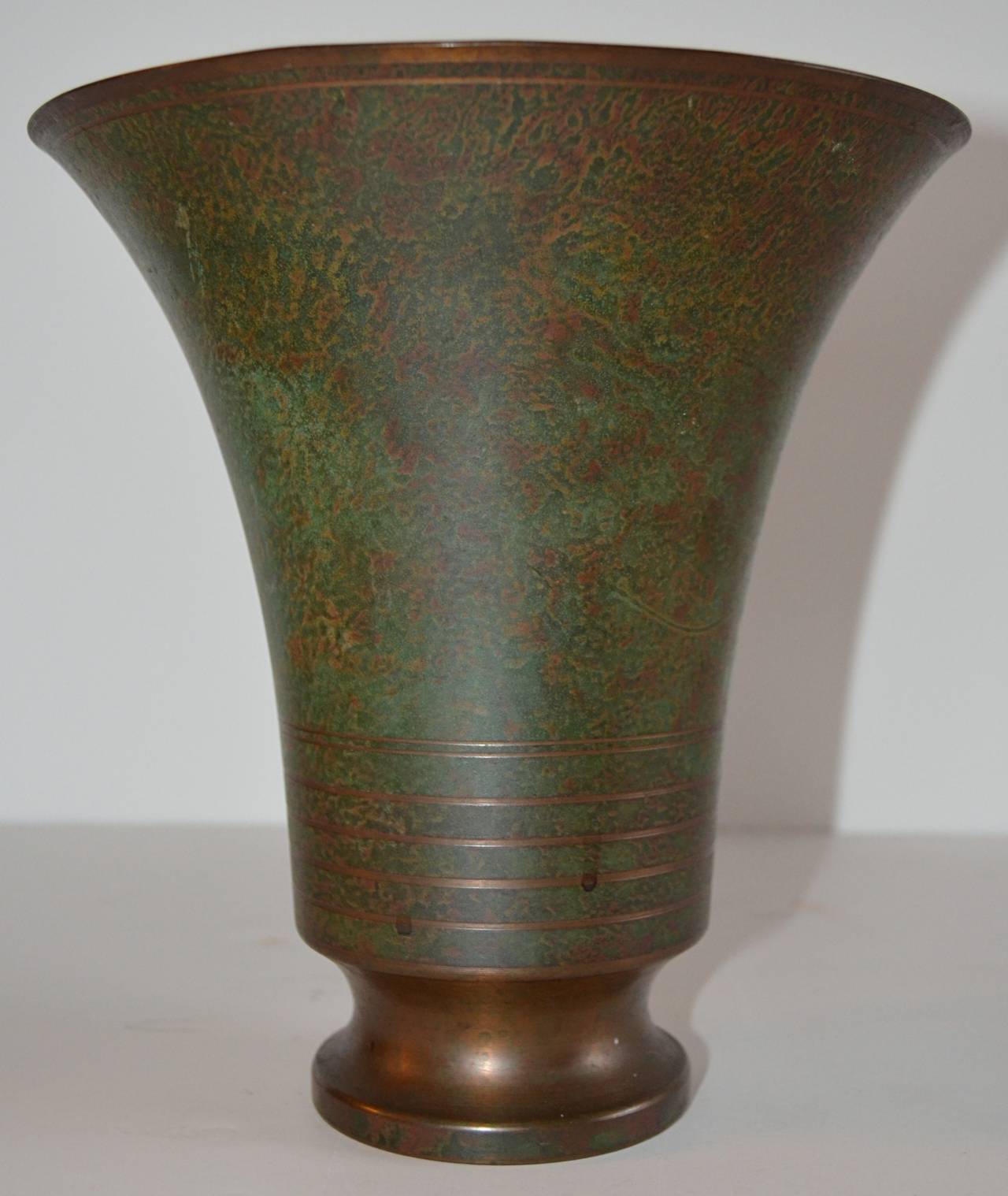 Three bronze pieces by noted Swedish Art Deco sculptor, Carl Sorensen. One vase 8.12