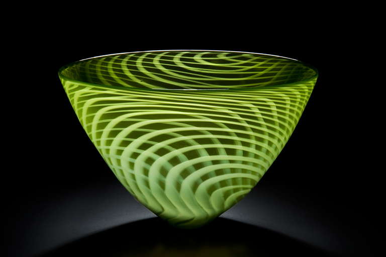 Large hand blown glass bowl using  Swedish 'graal' technique to produce 'wowen' white stripe pattern within the glass. Soft velvet matte finish on the outside. Unique piece.