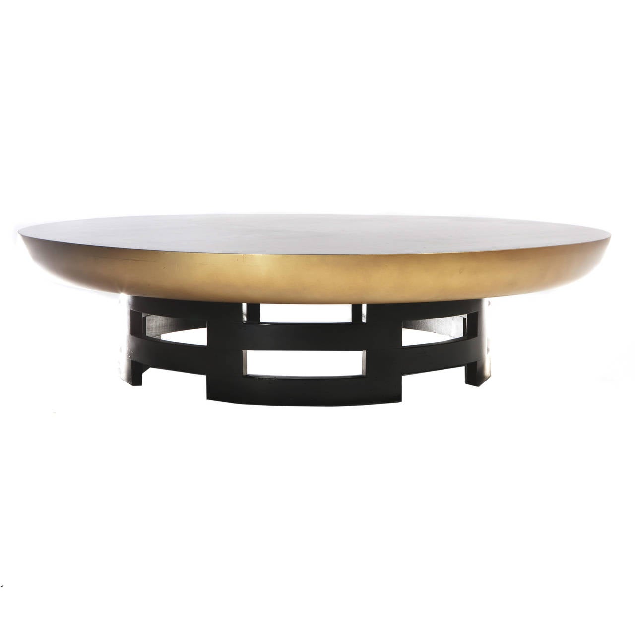The lacquered top features a deep beveled gilt edge and a brown-and-gold oil-drop finish in the shape of a flower. It rests on an interlocking, geometric, ebonized-wood base. Theodore Muller and Isabelle Barringer for Kittinger, USA, circa 1950s.