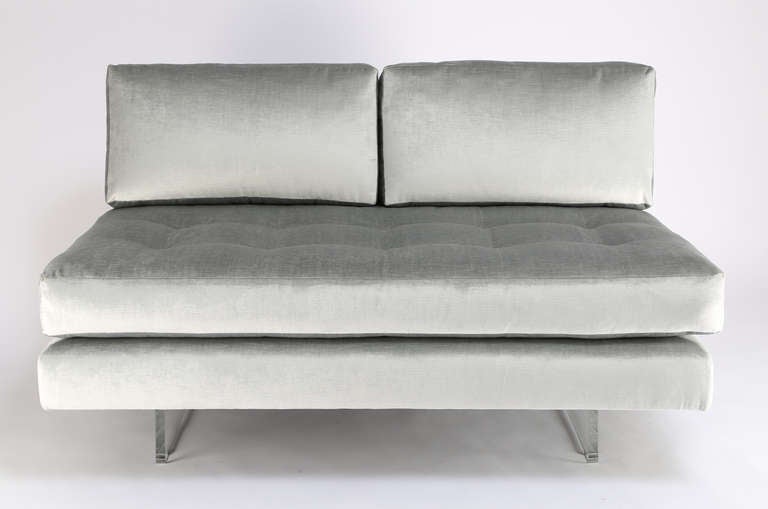 Pair of Vladimir Kagan Omnibus sofas with lucite slab legs. Newly reupholstered in shimmery silvery-blue vintage velvet.