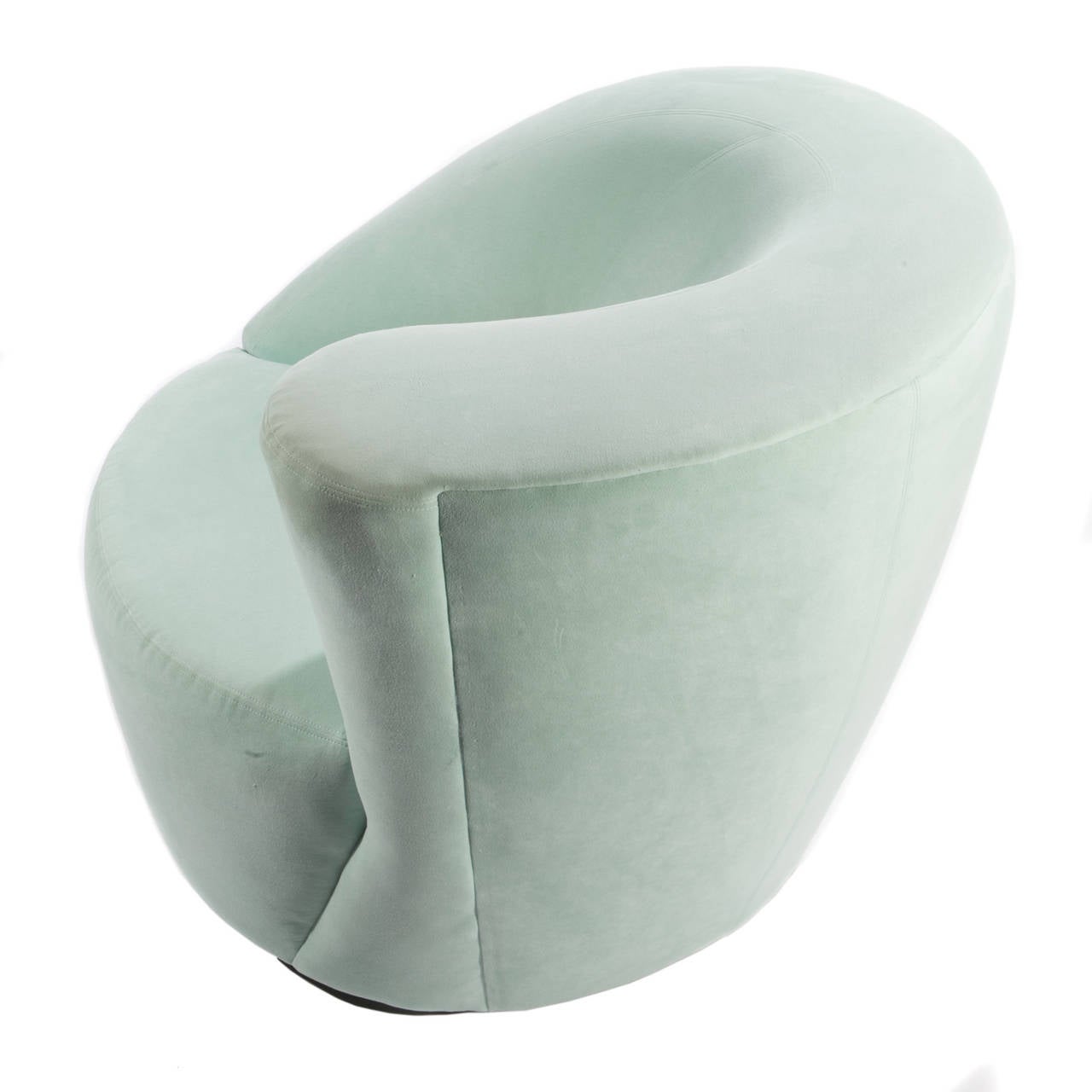 These beautiful, sculptural swivel chairs rotate and automatically return to their original positions. Original light-green microsuede upholstery with Directional tag on underside. These chairs are in our Brooklyn showroom.