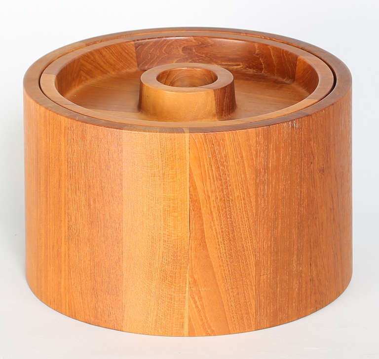 Beautiful teak ice bucket by Jens Quistgaard for Dansk. Made in Denmark. Original black plastic liner. 

