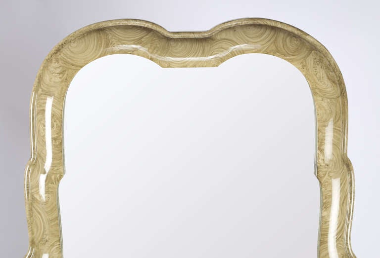Elegant tall mirror finished with decorative paint and a clear lacquer finish. Stamped made in Italy. Measure: 47-1/4" H x 19" W.  This item is at the 1stdibs Gallery at the New York Design Center, 200 Lexington Ave., 10th floor, New York,