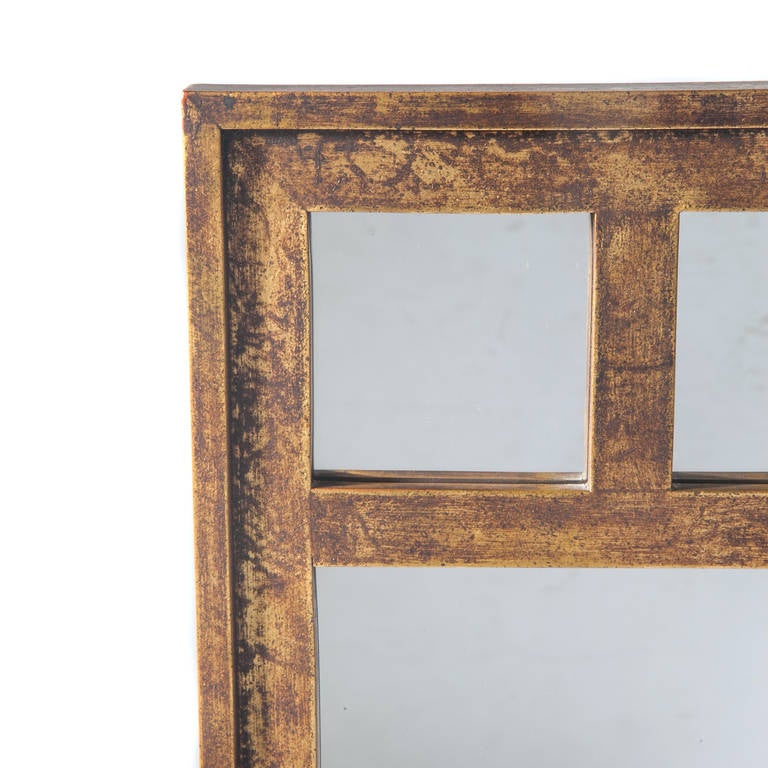 Rectangular form with gold-painted frame and interesting geometrical detail to partitions. 





