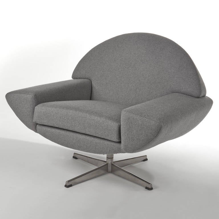 Large, beautifully proportioned and futuristic pair of Andersen swivel chairs, circa 1960s. These are moving, functional sculptures. Newly reupholstered in grey wool. 
