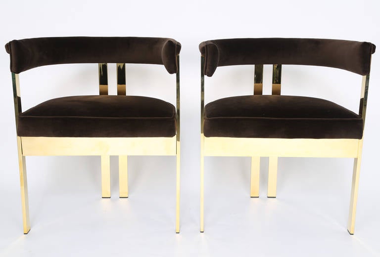 Pair of late-1950s Italian brass and velvet armchairs attributed to Tobia Scarpa. A lovely three-leg design with a single upholstered piece that serves as a rounded back and arms. Expertly polished and restored with new chocolate-brown cotton velvet