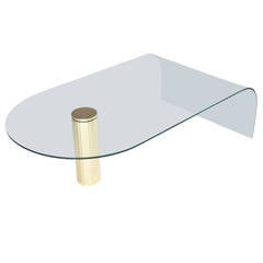 Curved Glass Cocktail Table with Single Brass Leg