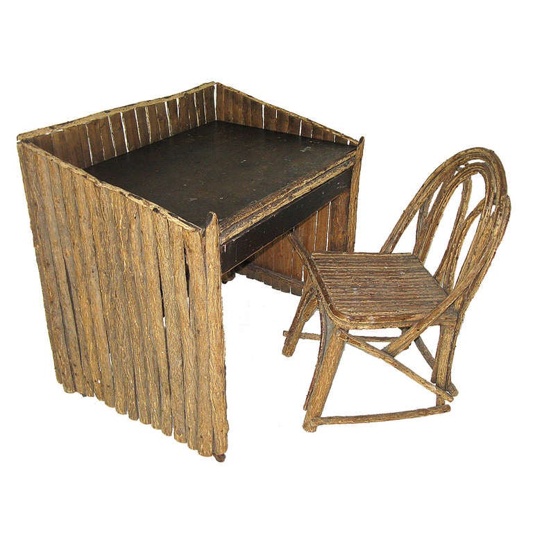 A stockade-style rustic writing desk with a matching bentwood elm chair (chair dimensions are 11