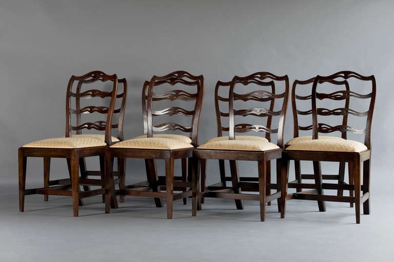 Eight George III mahogany ladder back dining chairs with drop in seats circa 1780 (set of 6 and 2 matching).