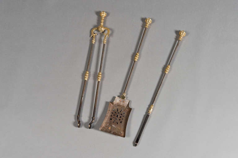 A Georgian 3 piece set of brass and steel fire irons