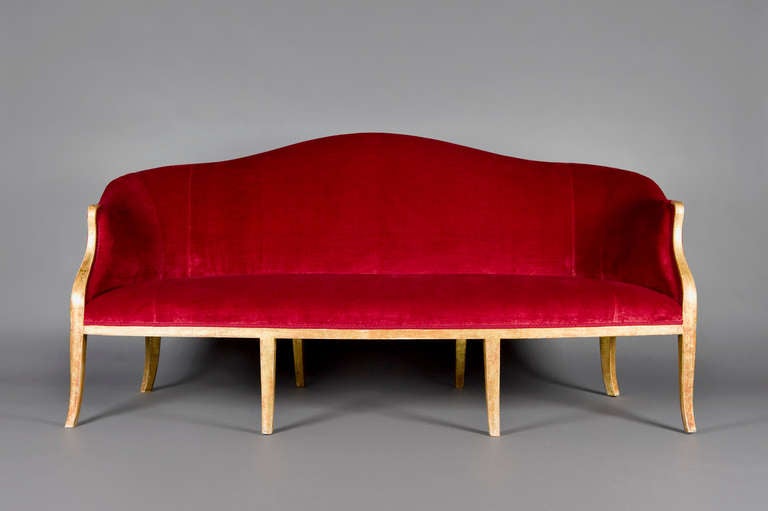 George III Giltwood sofa circa 1795, upholstered in a red cotton velvet