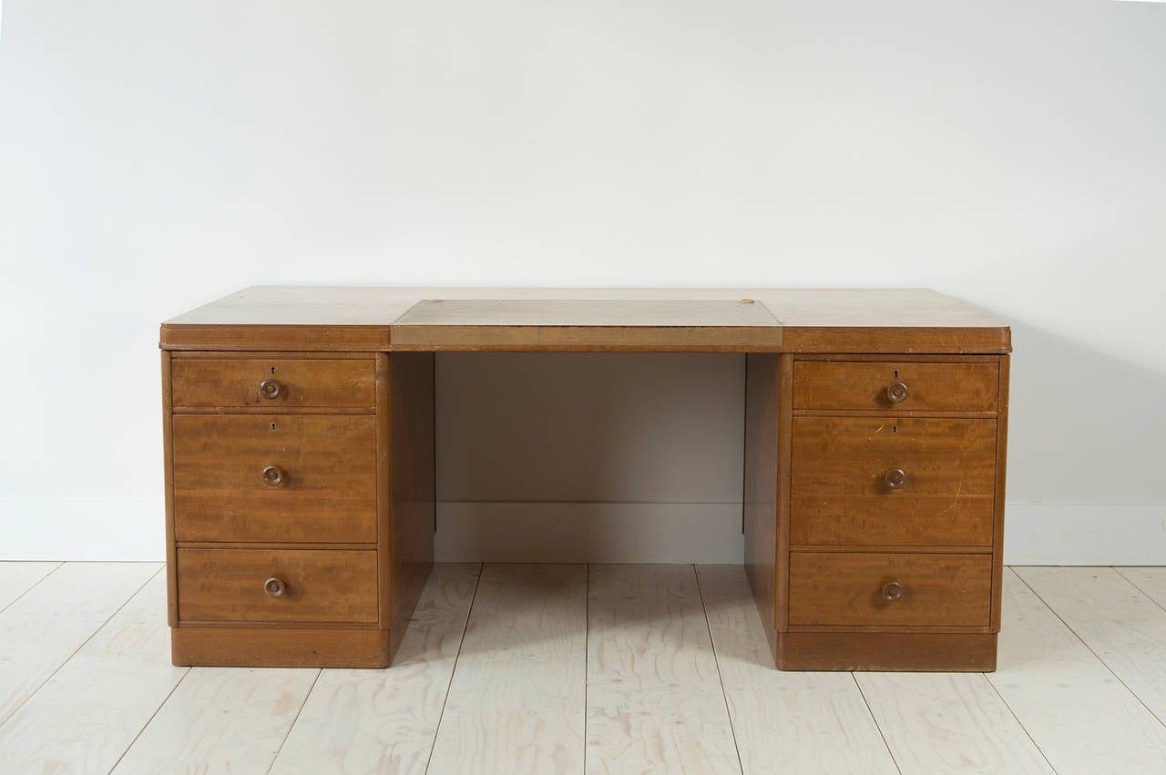 A large 1950’s pedestal office desk fitted with 6 drawers, 2 to take files