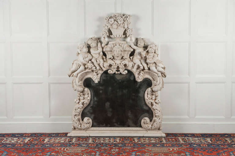 Late 17th century carved overmantle mirror, Northern France or Germany circa 1680. Restorations