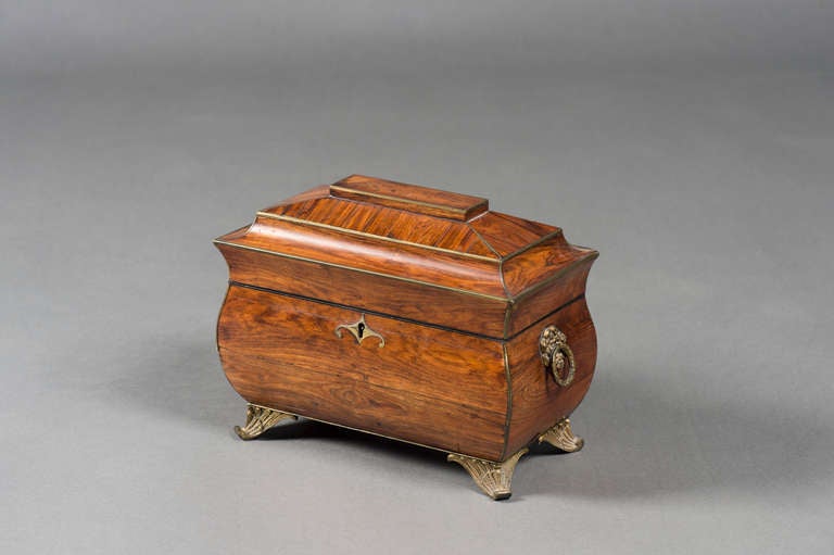 Early 19th Century Bombe Shaped Kingwood Veneered And Brass Strung Tea Caddy Of Exceptional Quality. With Its Original Handles, Feet And Red Moroccan Leather Lining, And Glass Mixing Bowl